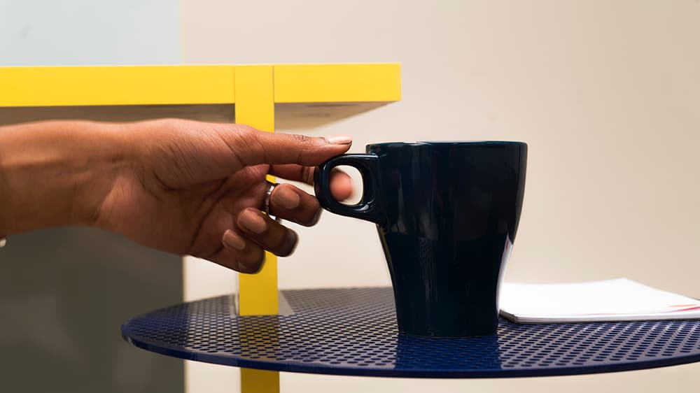 Everyone starts their day with a cup of coffee; the extruded side
    table will never let it spill on your documents ever again.